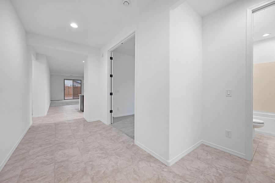 Representative unfurnished interior of a home built from the Origin by Taylor Morrison in Artisan at Asante Encore Collection, Surprise (Image 16). Representative unfurnished interior of a home built from the Origin by Taylor Morrison in Artisan at Asante Encore Collection, Surprise (Image 16).