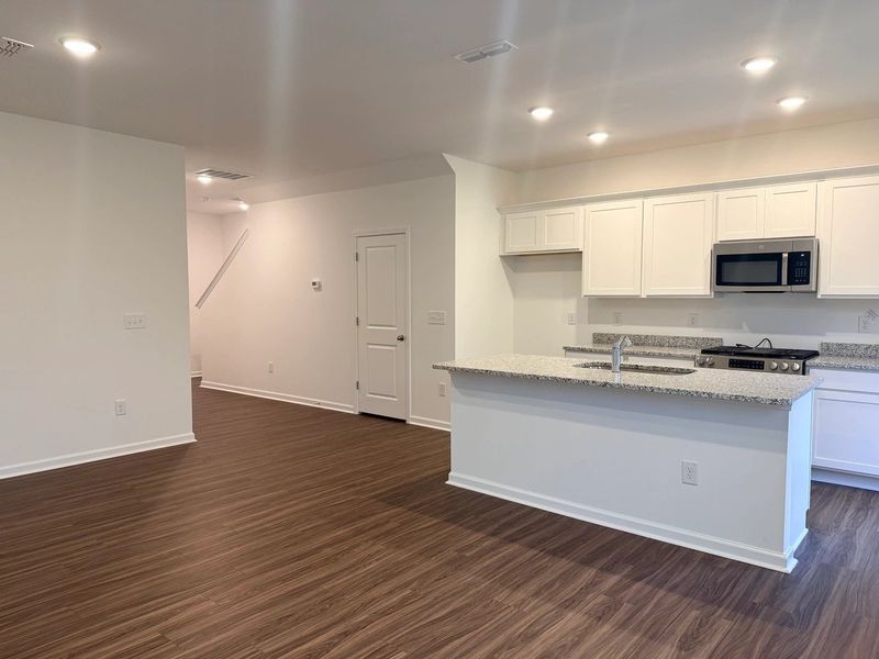 Kitchen - Chic white finishes and smooth surfaces shine. Kitchen - Chic white finishes and smooth surfaces shine.