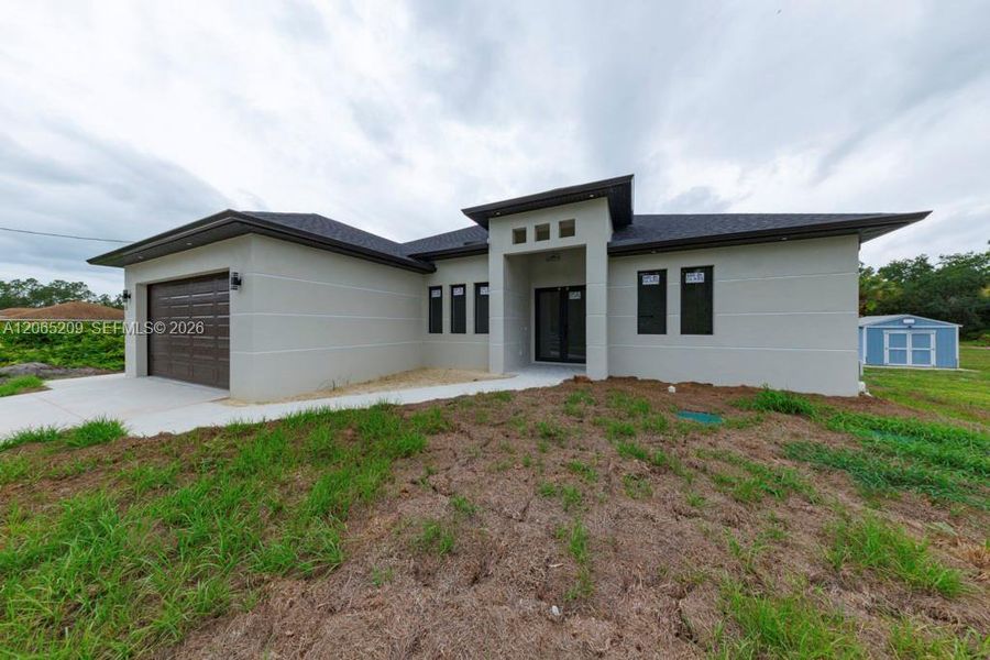 Exterior details and patio area of a home in , Lehigh Acres (Image 41).