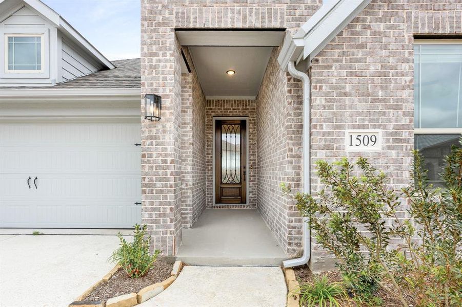 Exterior details and patio area of a home in ArrowBrooke, Aubrey (Image 27).