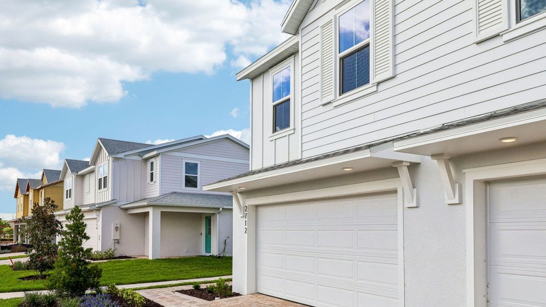 Exterior details and patio area of a home in Cyrene at Harmony, St. Cloud (Image 3).