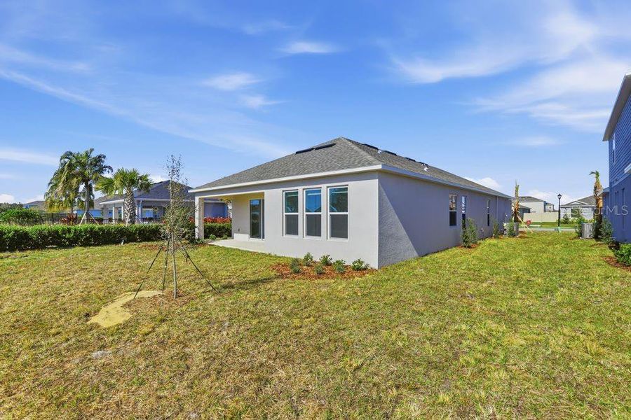 Exterior details and patio area of a home in Brookland Park, Auburndale (Image 3).