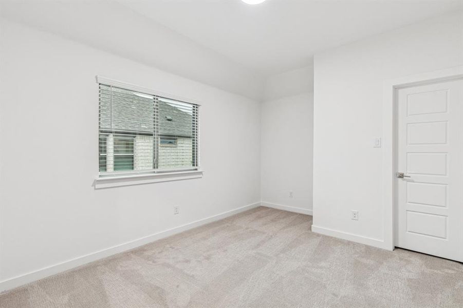 Bedroom in the Picasso II home plan by Trophy Signature Homes – REPRESENTATIVE PHOTO