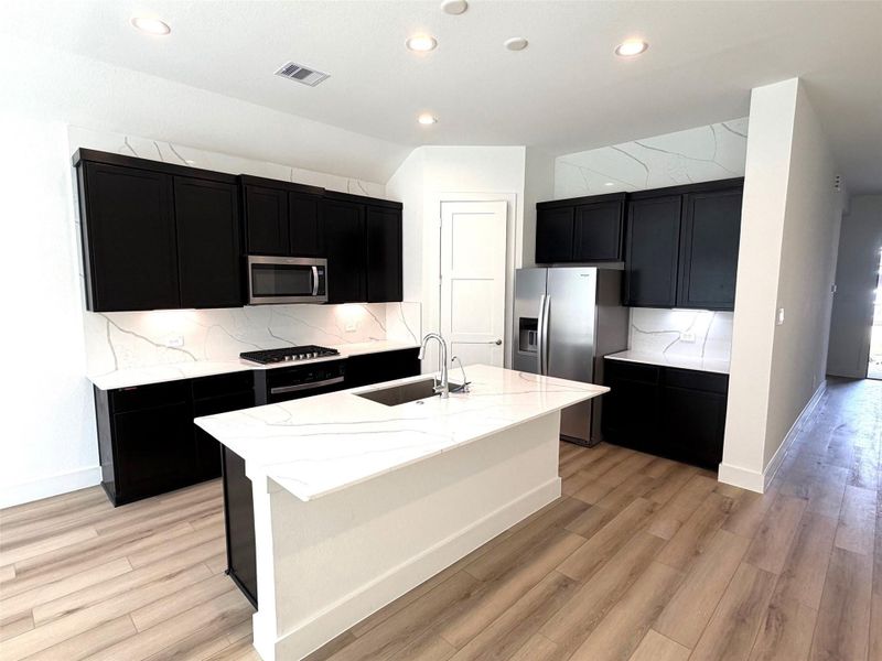 Furnished interior view inside a new home in Hills of Westlake, Conroe (Image 4).