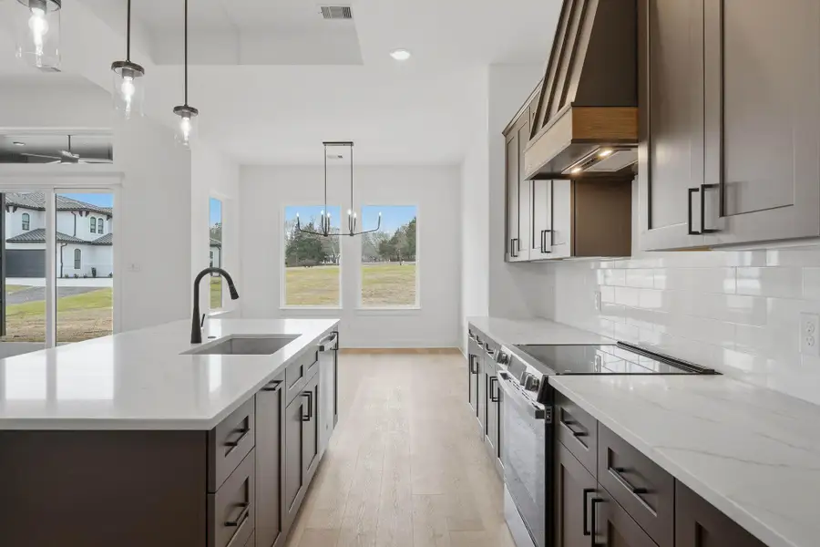 Stylish cabinetry and modern finishes create a clean, timeless kitchen design.