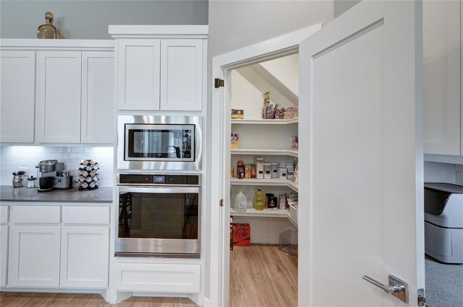 ANOTHER VIEW OF THE WALK-IN PANTRY