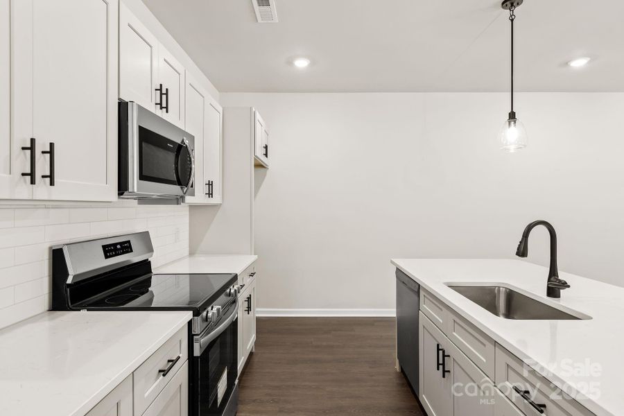 Furnished interior view inside a new home in , Charlotte (Image 6).