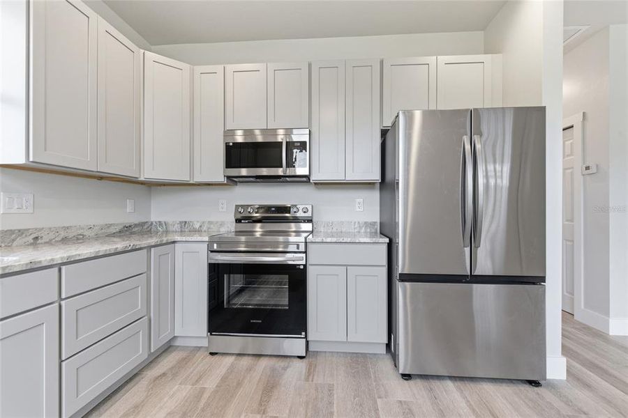 Furnished interior view inside a new home in , Punta Gorda (Image 5).