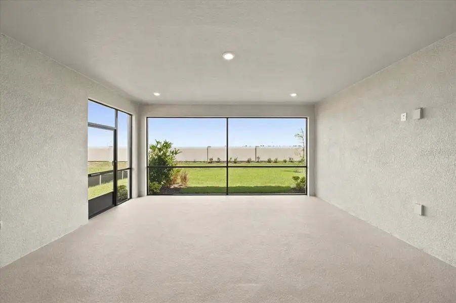 Exterior details and patio area of a home in Coasterra Community Group Page, Palmetto (Image 3).