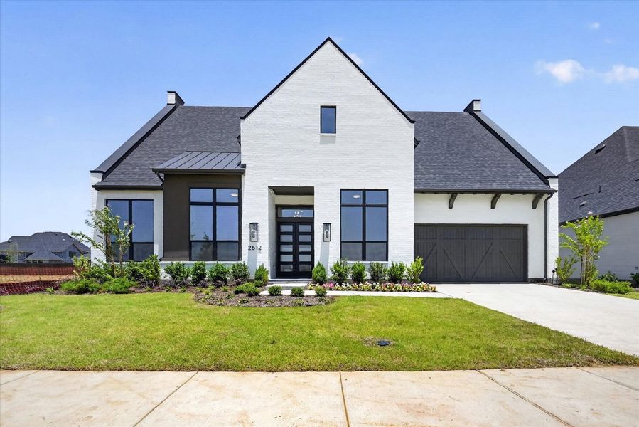 Front exterior of a new home in Cambridge Crossing, Celina, TX, highlighting curb appeal (Image 1). Front exterior of a new home in Cambridge Crossing, Celina, TX, highlighting curb appeal (Image 1).