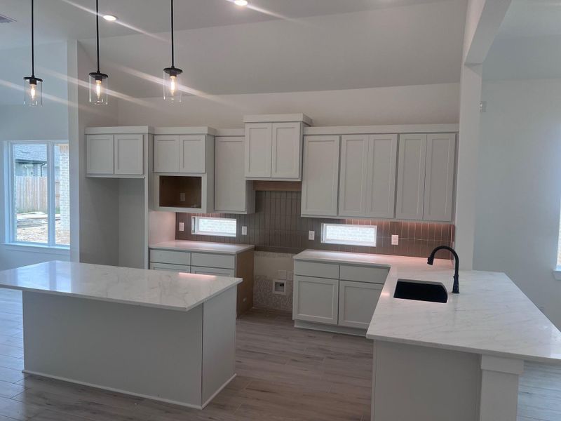Furnished interior view inside a new home in Wood Leaf Reserve, Tomball (Image 4).