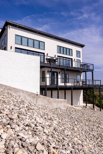 Exterior details and patio area of a home in , Kerrville (Image 38).