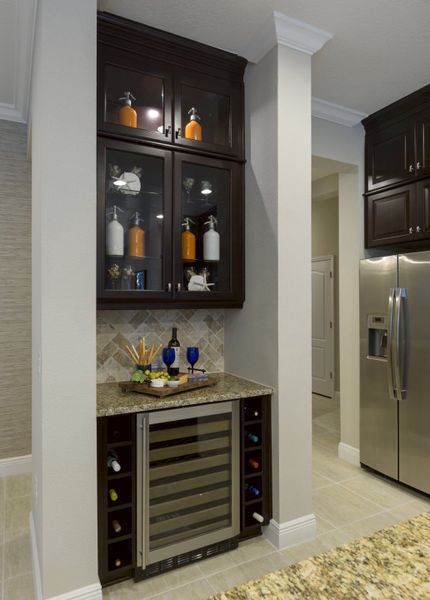 Furnished interior view inside a new home in Boca Royale Golf & Country Club at Wellen Park, Englewood (Image 16).