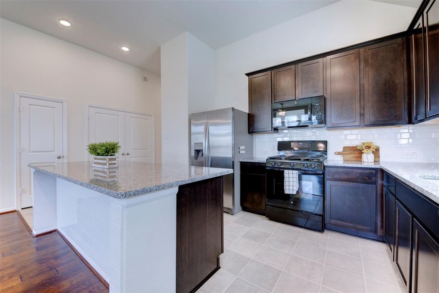 Furnished interior view inside a new home in Sunterra, Katy (Image 11).