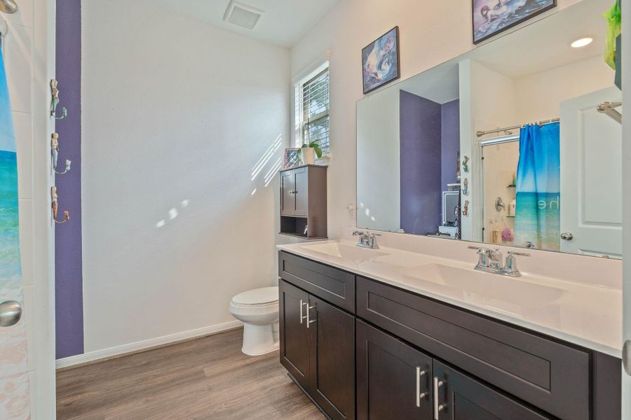 Furnished interior view inside a new home in The Pines At Seven Coves, Willis (Image 24). Furnished interior view inside a new home in The Pines At Seven Coves, Willis (Image 24).