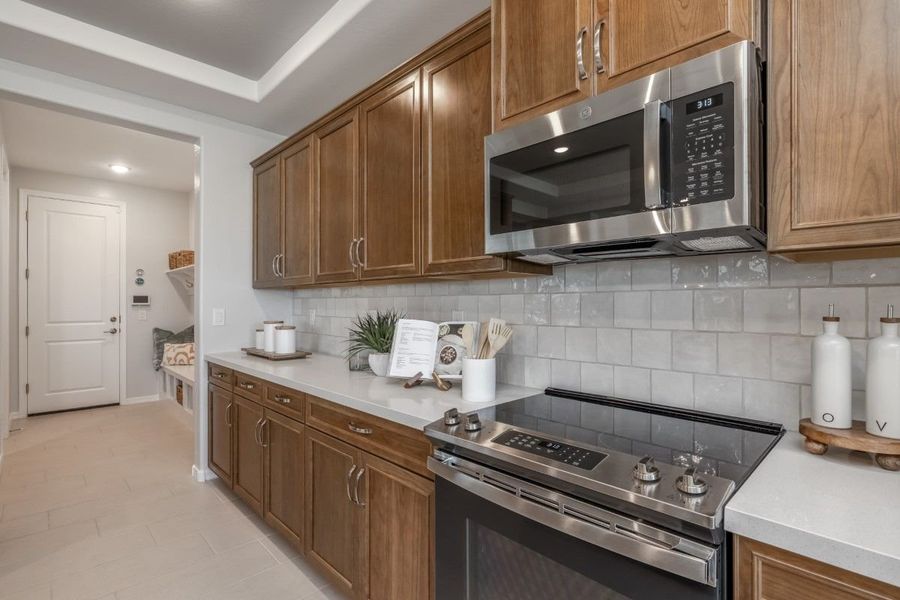 Furnished interior view inside a new home in The Grove at El Cidro, Goodyear (Image 8).