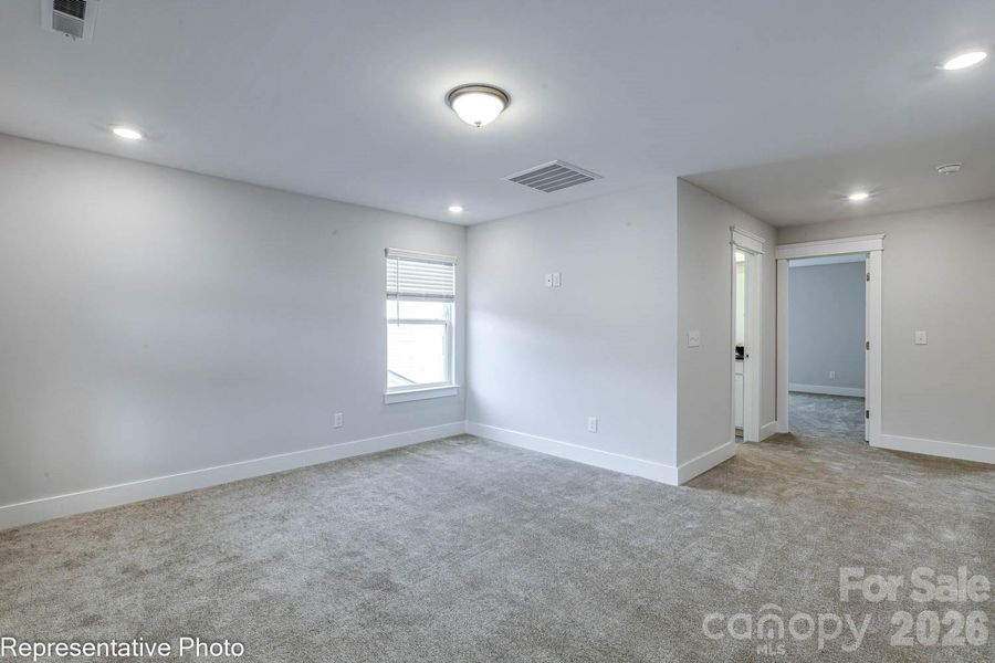 Spacious, unfurnished interior of a new home in Ashton Park, Monroe (Image 36).