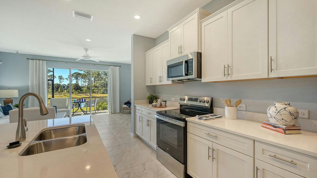 Furnished interior view inside a new home in Grand Park Real Estate and Homes for Sale in Sarasota, FL - Neal Communities, Sarasota (Image 16). Furnished interior view inside a new home in Grand Park Real Estate and Homes for Sale in Sarasota, FL - Neal Communities, Sarasota (Image 16).
