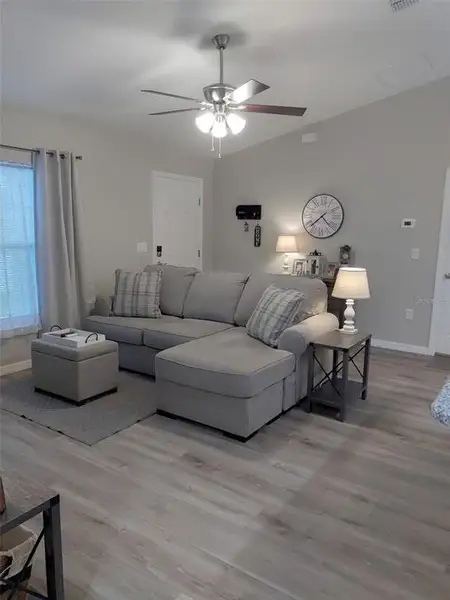 Furnished interior view inside a new home in , Dunnellon (Image 7).