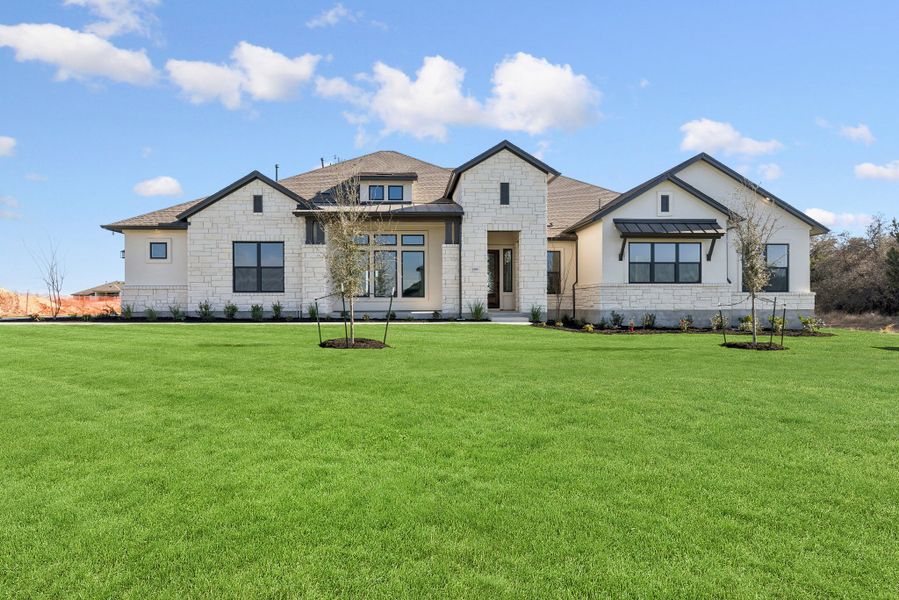 Representative exterior photo of a completed home built from the The Mcclure by David Weekley Homes in Leander Estates, Leander, TX (Image 1). Representative exterior photo of a completed home built from the The Mcclure by David Weekley Homes in Leander Estates, Leander, TX (Image 1).