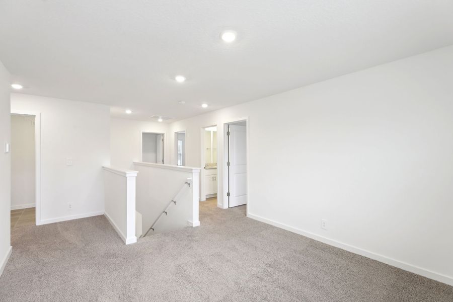 Spacious, unfurnished interior of a new home in Lakes at Bella Lago - Signature Series, Green Cove Springs (Image 7).