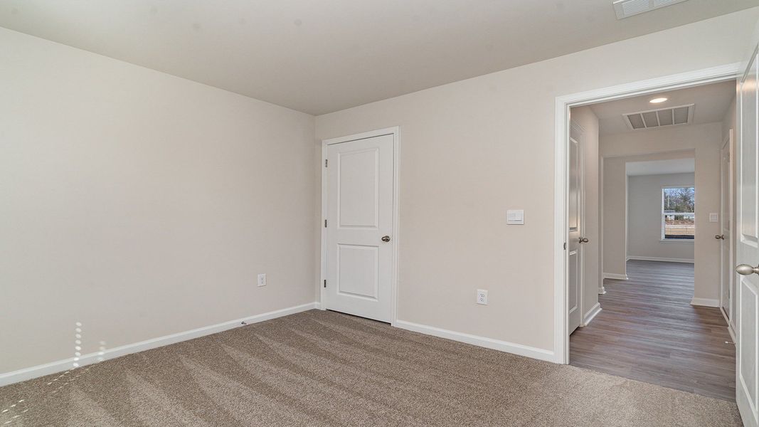 Spacious, unfurnished interior of a new home in The Meadows at Wildwood Village, Shallotte (Image 25).