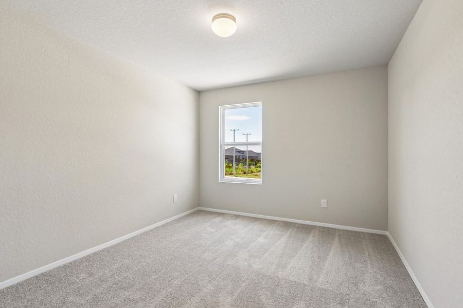Spacious, unfurnished interior of a new home in Hunters Ranch, San Antonio (Image 26).