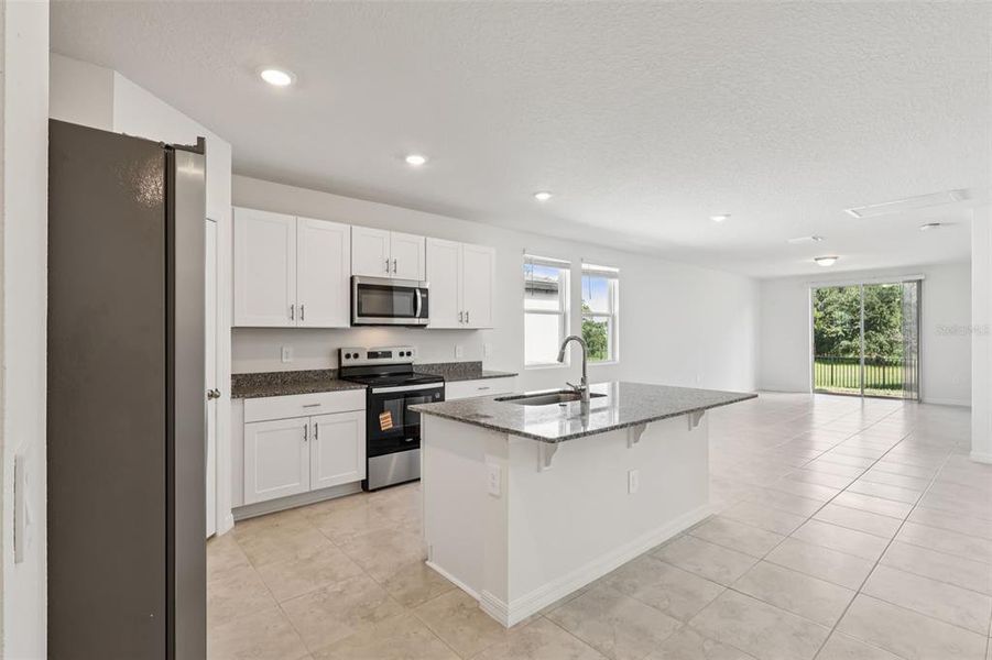Furnished interior view inside a new home in Bradbury Creek - Signature Series, Haines City (Image 11).