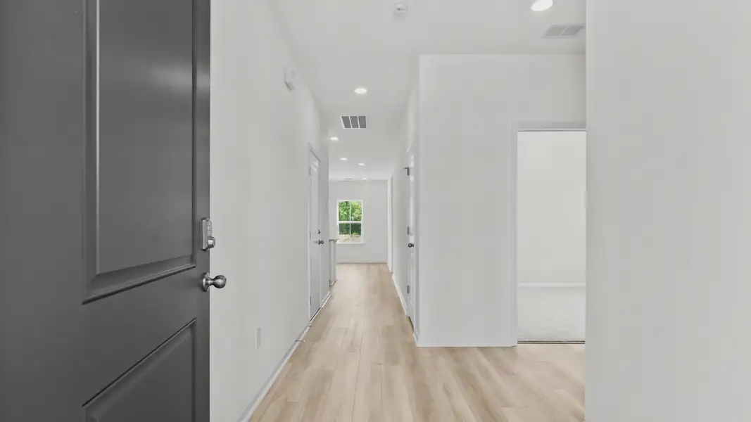 Furnished interior view inside a new home in Bluffs at Sun Colony, Longs (Image 4).