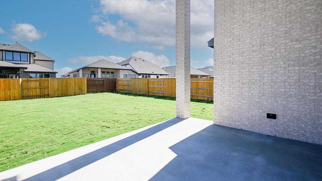 Exterior details and patio area of a home in 6 Creeks 50', Kyle (Image 3).