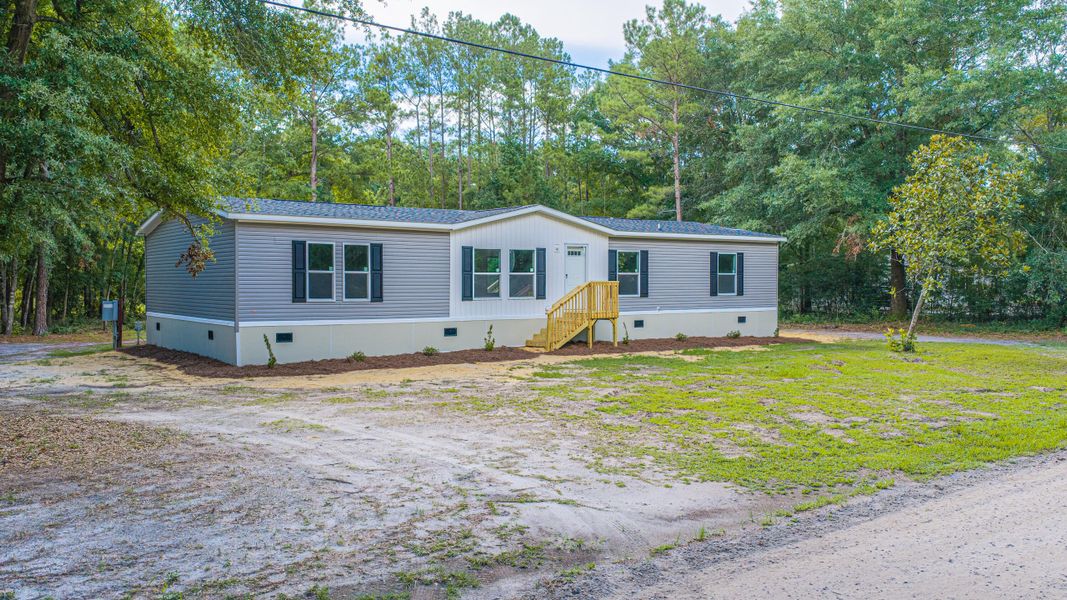 Exterior details and patio area of a home in , Walterboro (Image 35).