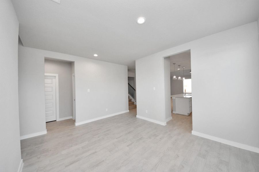 Discover another perspective of the spacious dining space. Sample photo of completed home with similar floor plan. Actual colors and selections may vary. Discover another perspective of the spacious dining space. Sample photo of completed home with similar floor plan. Actual colors and selections may vary.