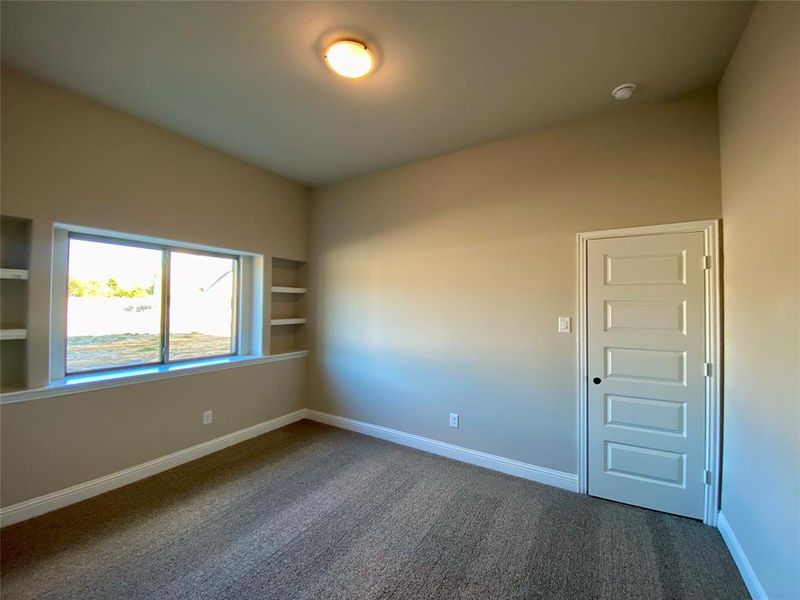 Bed 2 downstairs with built-in shelves Bed 2 downstairs with built-in shelves