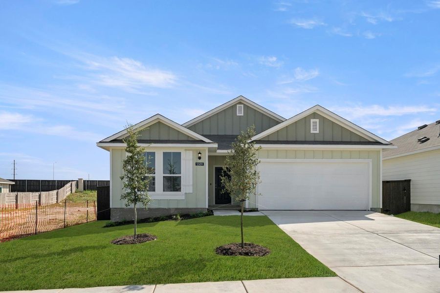 Front exterior of a new home in Cloverleaf, Austin, TX, highlighting curb appeal (Image 22).