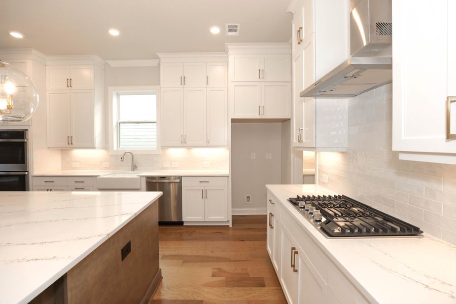 Representative furnished interior of a home built from the The Maddox by The Providence Group in Bellmoore Park, Johns Creek (Image 7).