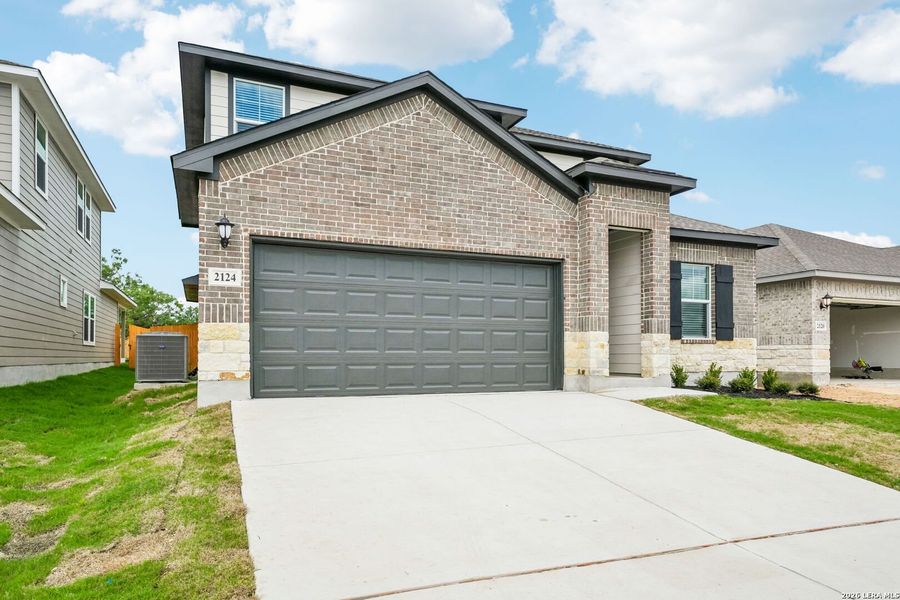 Front exterior of a new home in Stetson Ridge, Marion, TX, highlighting curb appeal (Image 23).