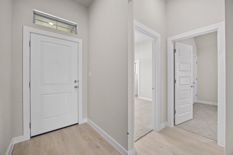Entry in the Brazos home plan by Trophy Signature Homes – REPRESENTATIVE PHOTO