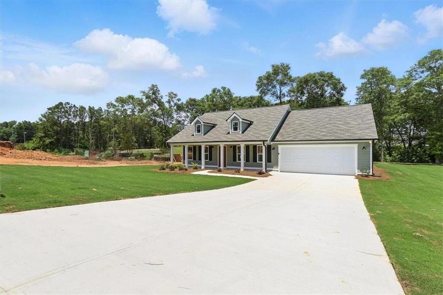 Front exterior of a new home in , Hartwell, GA, highlighting curb appeal (Image 20).