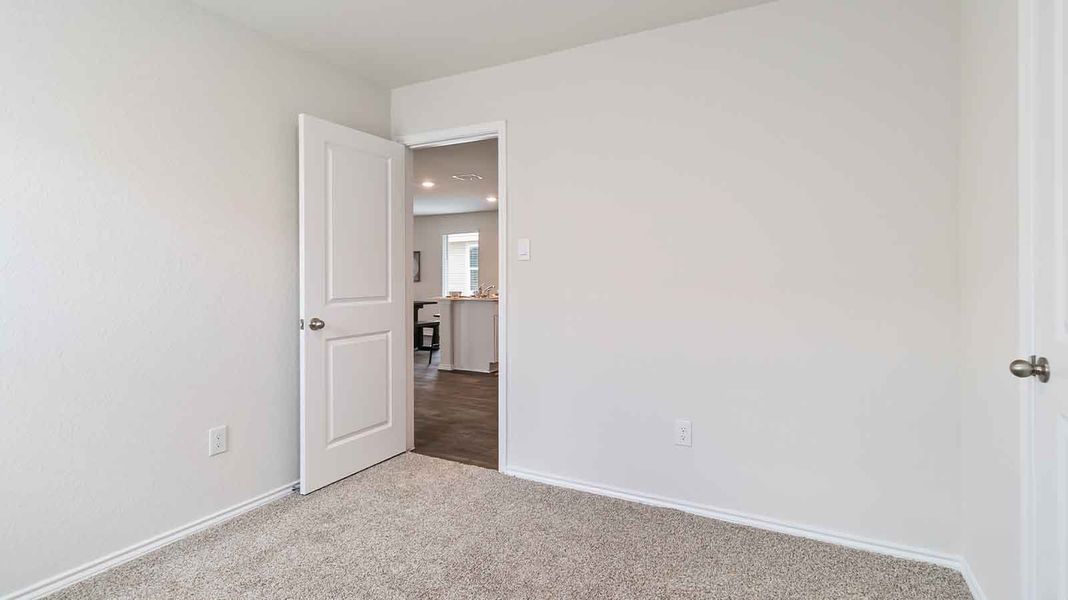 Representative unfurnished interior of a home built from the Barton by D.R. Horton in Watermark, Alvin (Image 15).