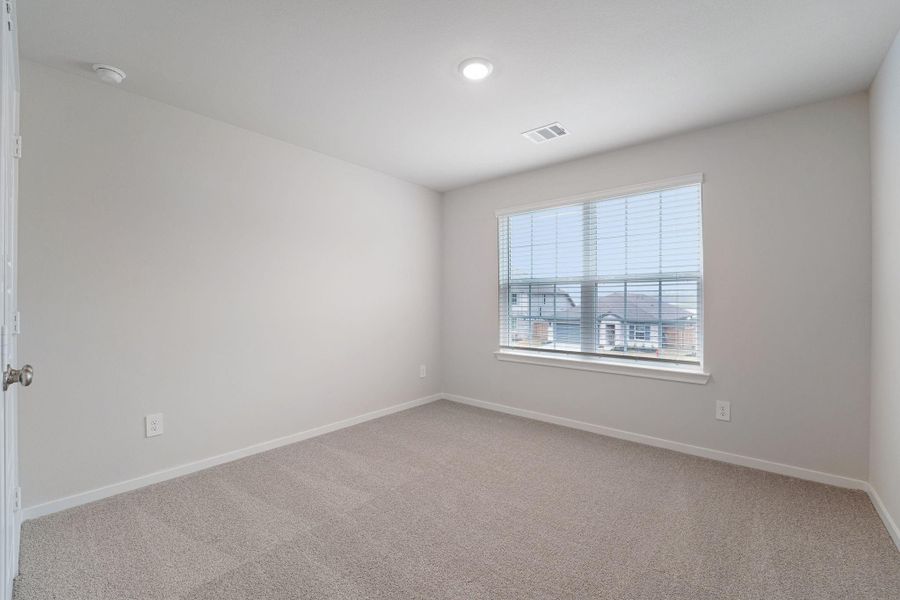 Spacious, unfurnished interior of a new home in Granger Pointe - Premier Series, Conroe (Image 35).