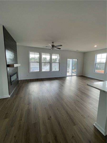 This airy living space features soaring ceilings a