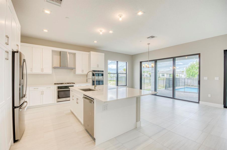 Furnished interior view inside a new home in Apex at Avenir, Palm Beach Gardens (Image 48).