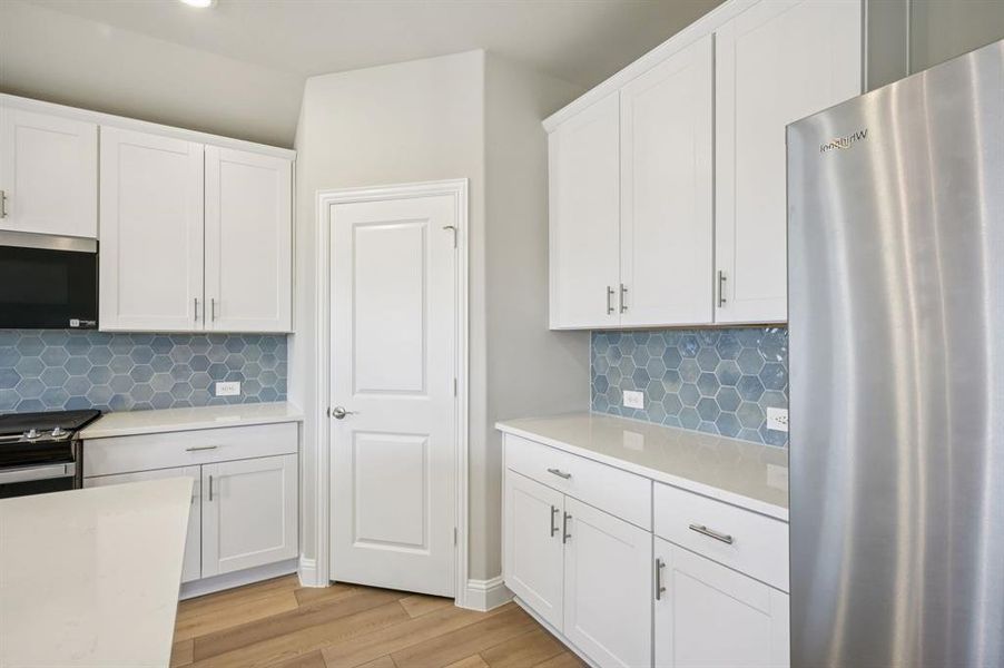 Photo is not of the actual home, but is an inspirational photo of builder’s model home and may depict options, furnishings, and/or decorator features that are not included.