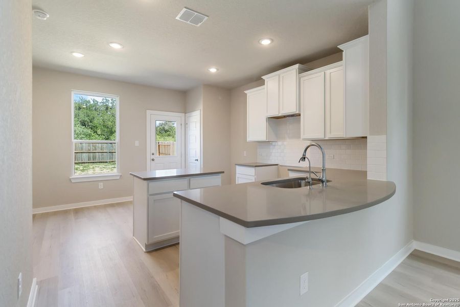 Furnished interior view inside a new home in Timber Creek, San Antonio (Image 8).
