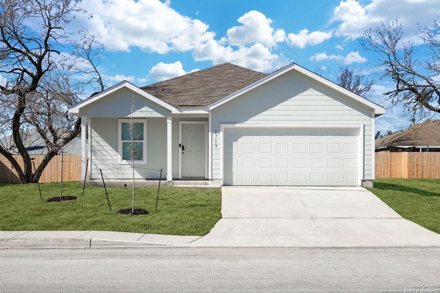 Front exterior of a new home in Vista Point, San Antonio, TX, highlighting curb appeal (Image 2). Front exterior of a new home in Vista Point, San Antonio, TX, highlighting curb appeal (Image 2).