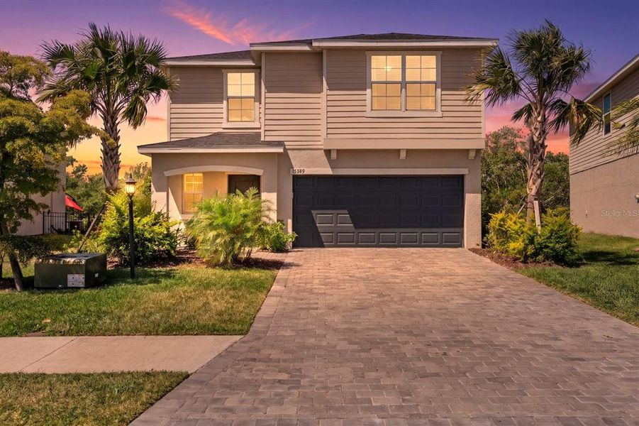 Front exterior of a new home in , Bradenton, FL, highlighting curb appeal (Image 20).