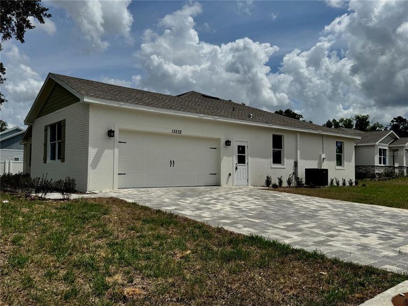 Front exterior of a new home in , Dade City, FL, highlighting curb appeal (Image 25).