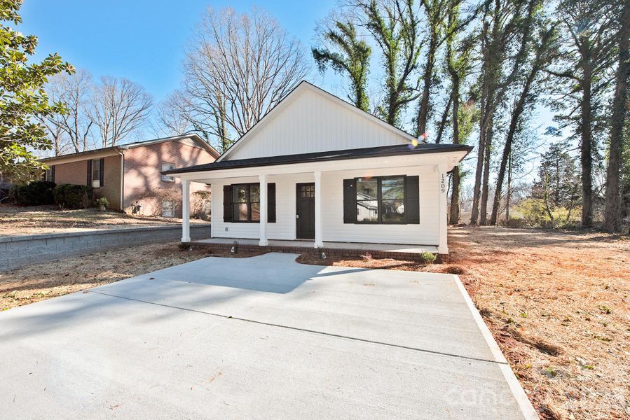 Front exterior of a new home in , Kannapolis, NC, highlighting curb appeal (Image 16).