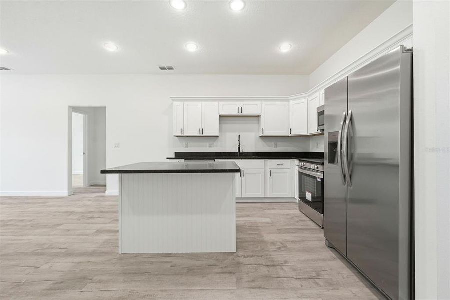 Furnished interior view inside a new home in , Haines City (Image 43).