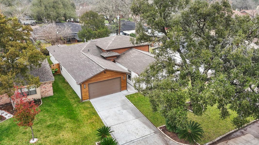 Front exterior of a new home in , Houston, TX, highlighting curb appeal (Image 24).
